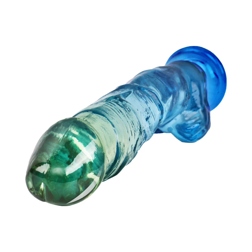 Adam & Eve Sunrise Dreams Realistic Dildo against a soft fabric backdrop; a colorful and enticing realistic dildo for all lovers.