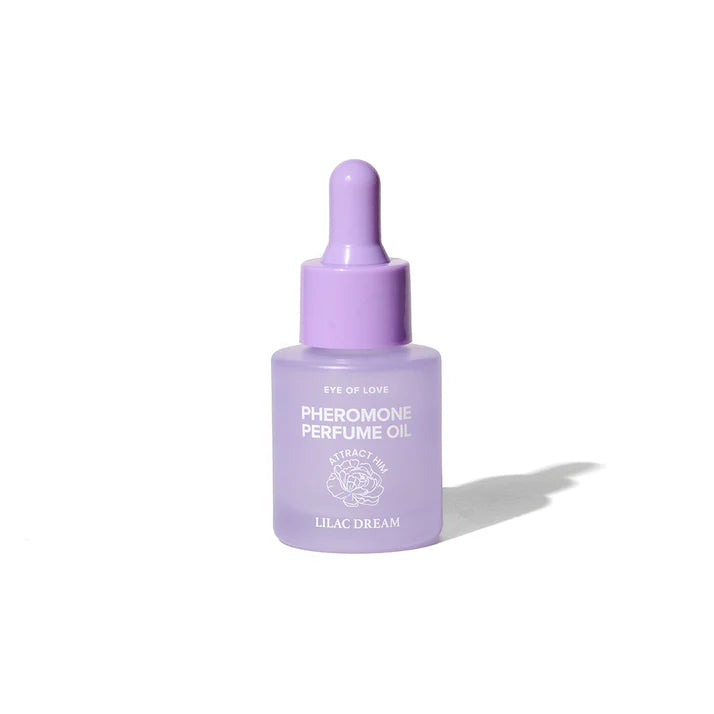 Eye of Love Pheromone Parfum Oil 0.67 oz - Lifestyle image featuring a woman confidently applying the seductive perfume on pulse points.