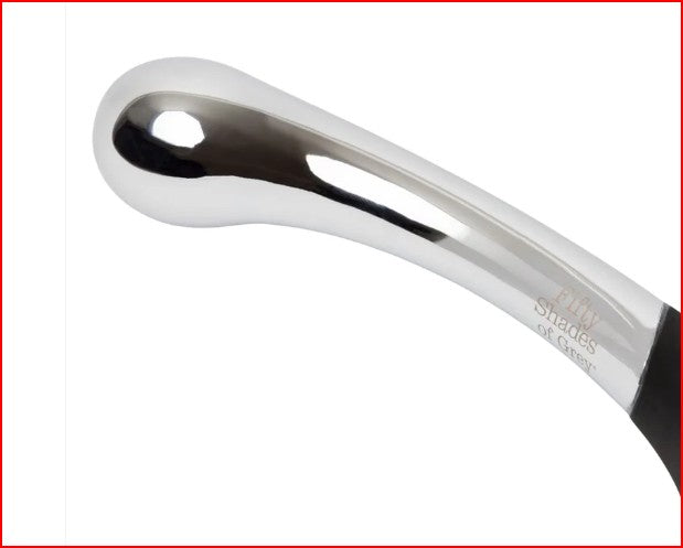 Fifty Shades of Grey Sweet Pressure Silicone &amp; Metal Wand in an elegant setting, emphasizing its quality and sophistication for enhancing romantic experiences.